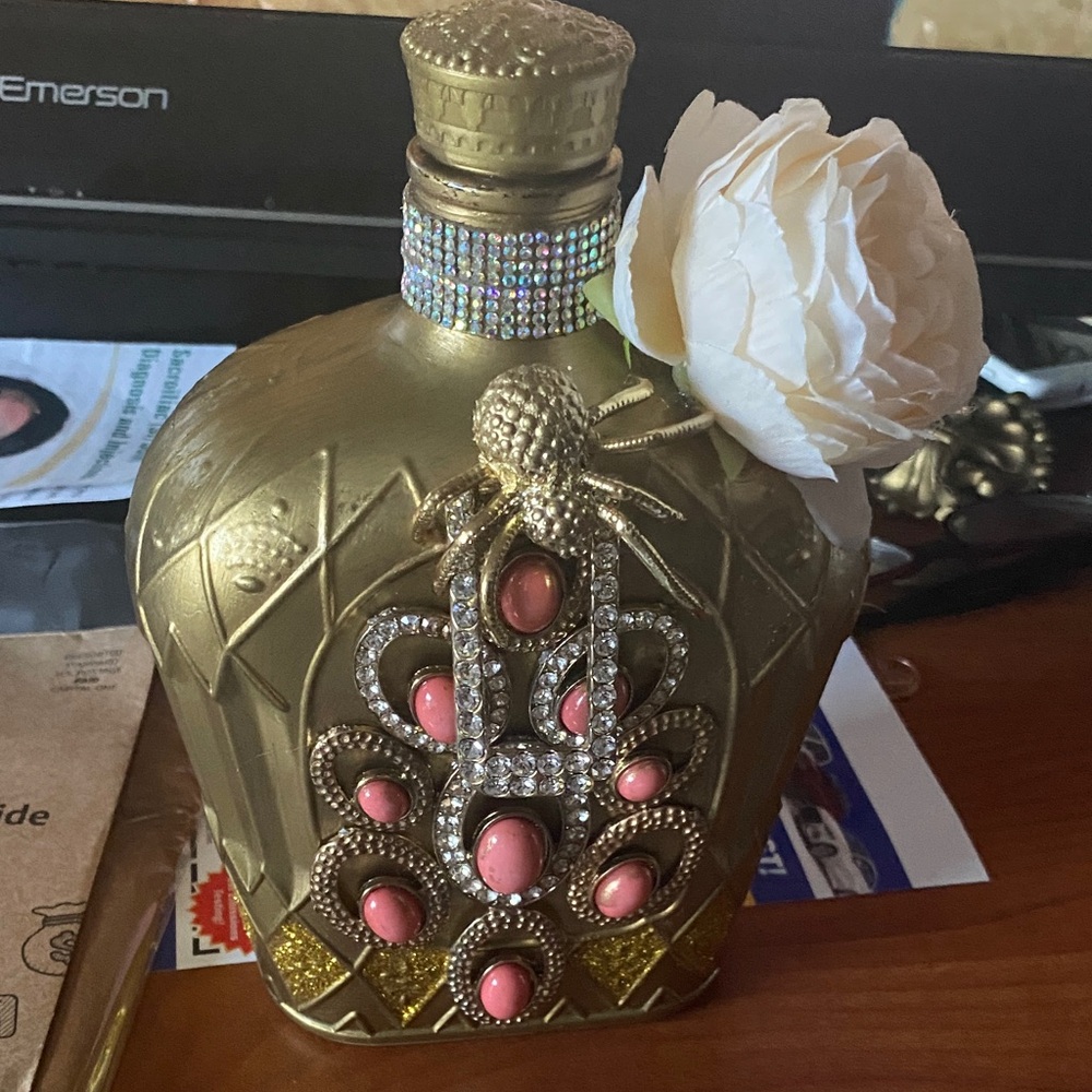 Gold and Pink Decorative Bottle with Flower Accent